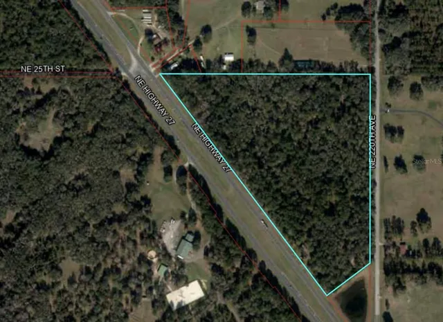 a view of balcony with wooden floor