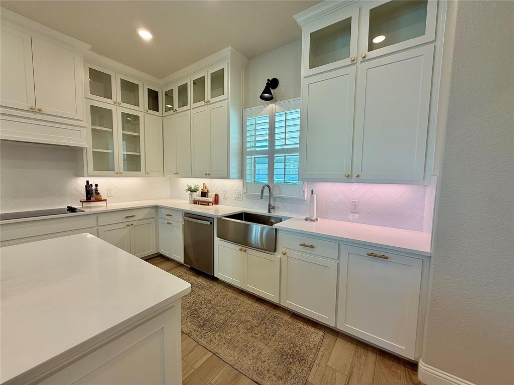 649 Gray Road Burleson, TX 76028 - Photo 12 of 28 a kitchen that has a sink and a stove in it