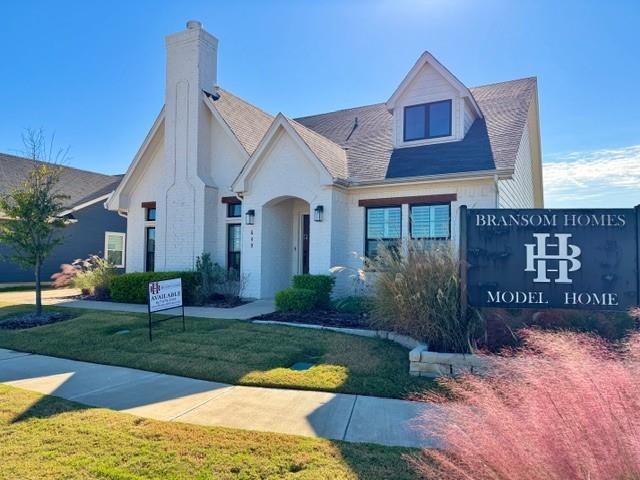 649 Gray Road Burleson, TX 76028 - Photo 27 of 28 a front view of a house with garden