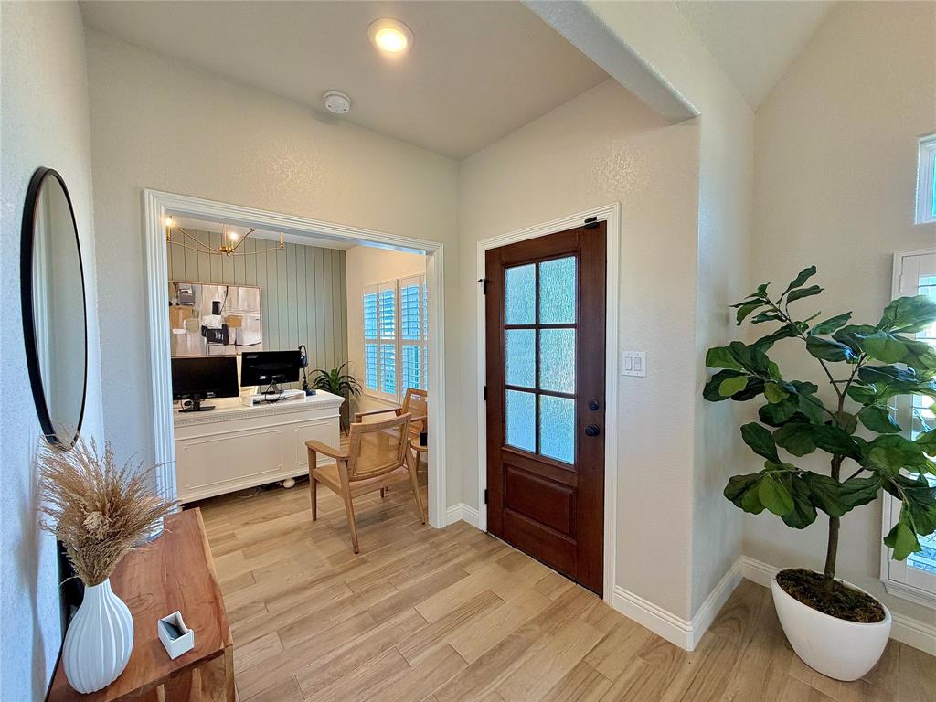 649 Gray Road Burleson, TX 76028 - Photo 9 of 28 a dining room with furniture and a potted plant