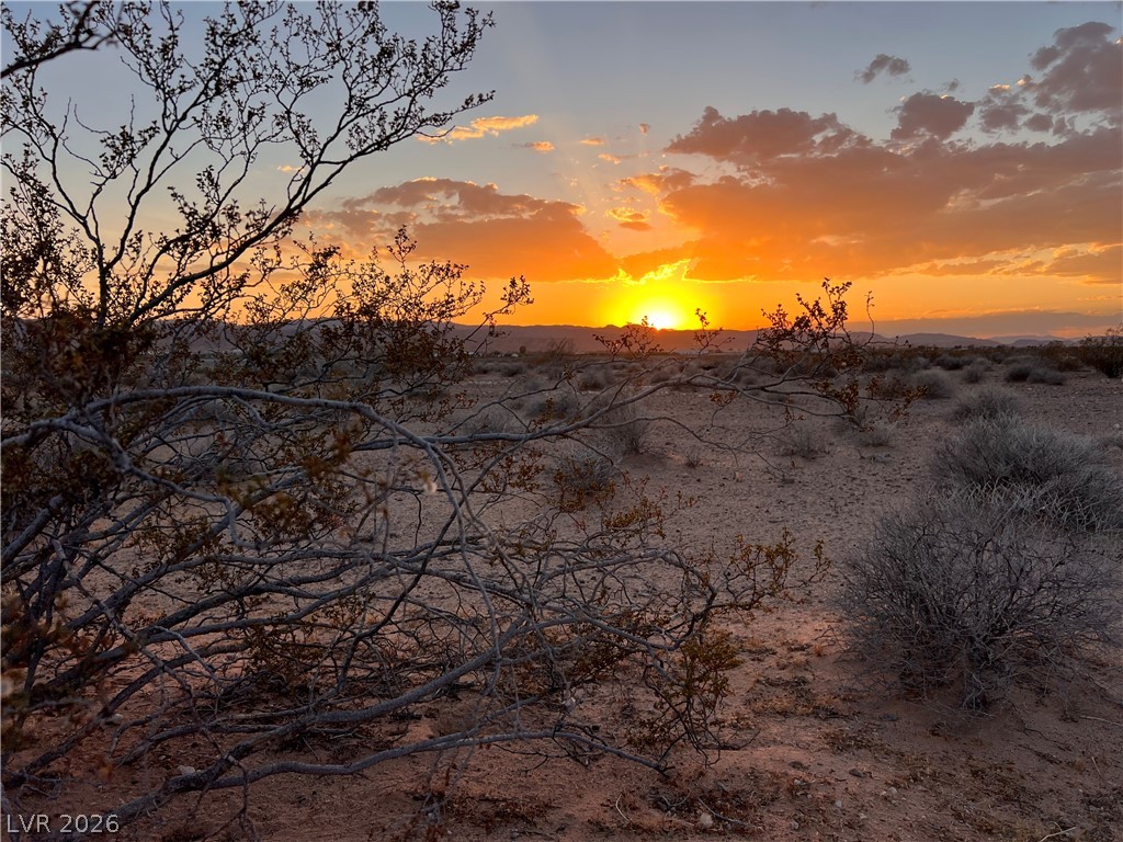 North Ishimoto Overton, NV 89040 - Photo 4 of 10 Witness the fiery desert sunset from this expansive, tranquil landscape.