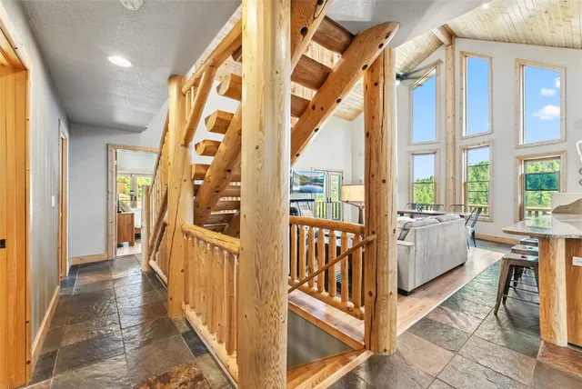 a view of an entryway with livingroom