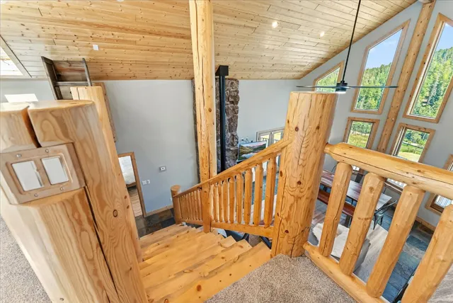 a view of stairs and wooden floor