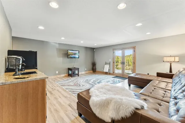a living room with furniture and a table