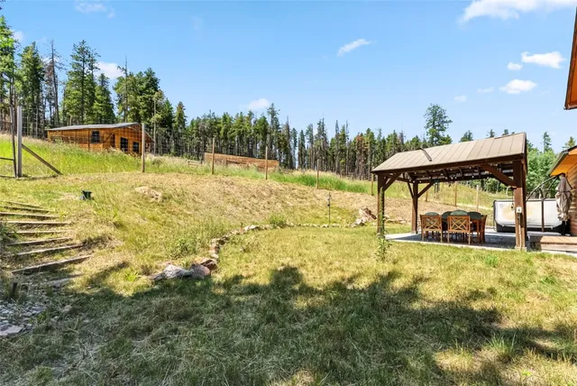 a aerial view of a house with a lake view