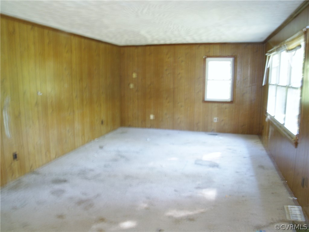 9570 Richmond Road Lanexa, VA 23089 - Photo 3 of 11 Paneled living room.