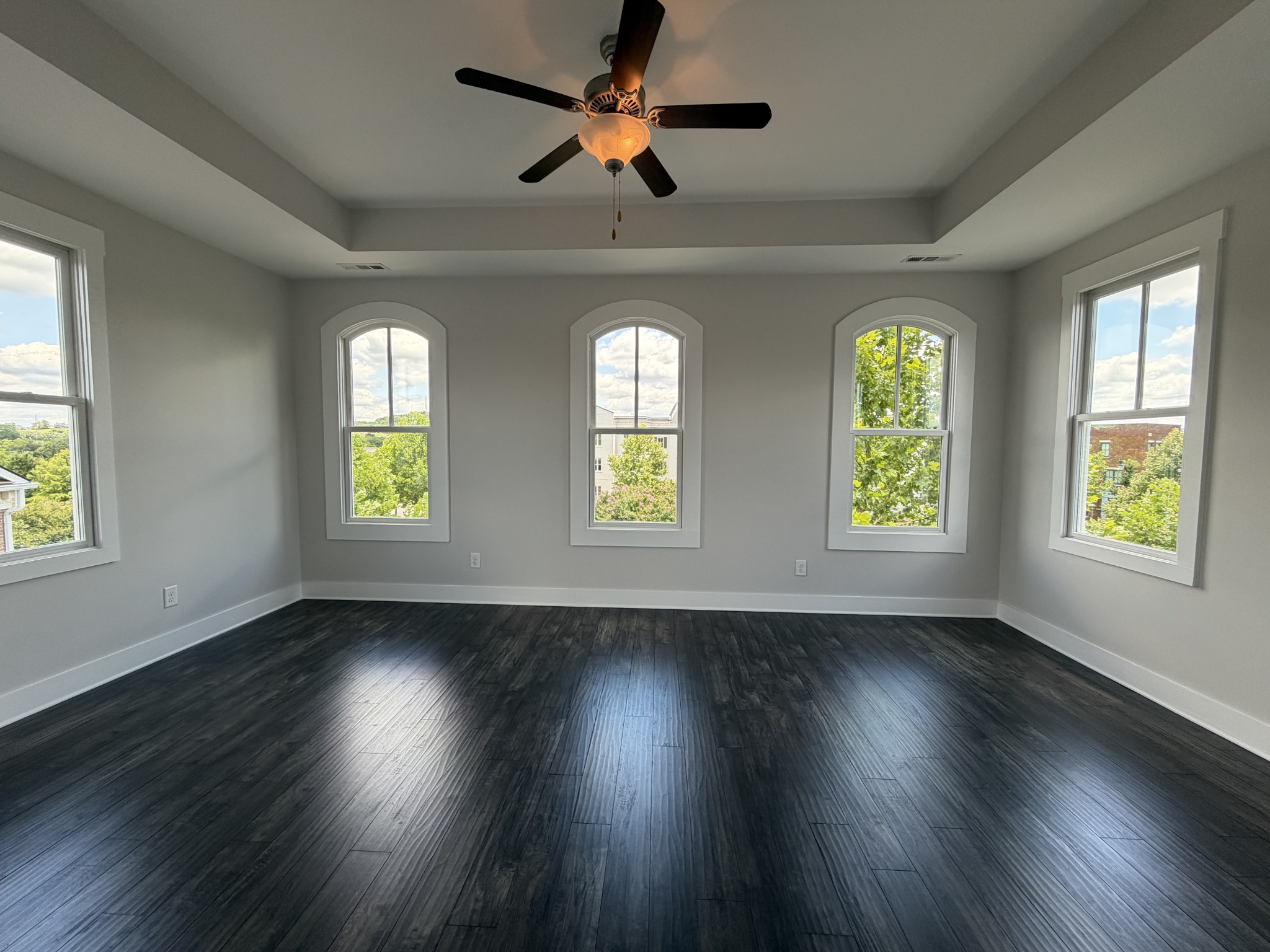 3097 Rural Plains Circle Franklin, TN 37064 - Photo 25 of 28 a view of an empty room with wooden floor and a window