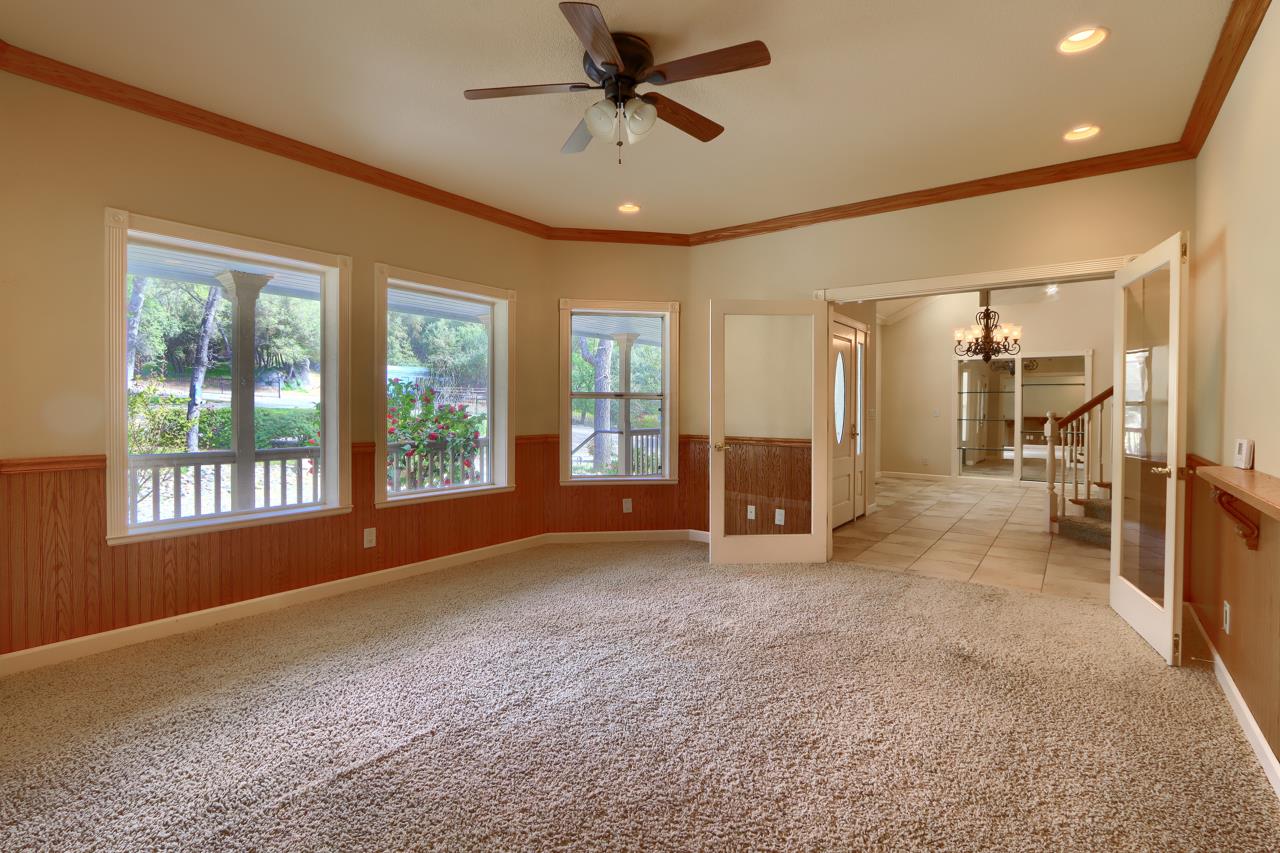 46580 Vista Del Rio Drive Oakhurst, CA 93644 - Photo 28 of 82 a view of empty room with wooden floor and fan