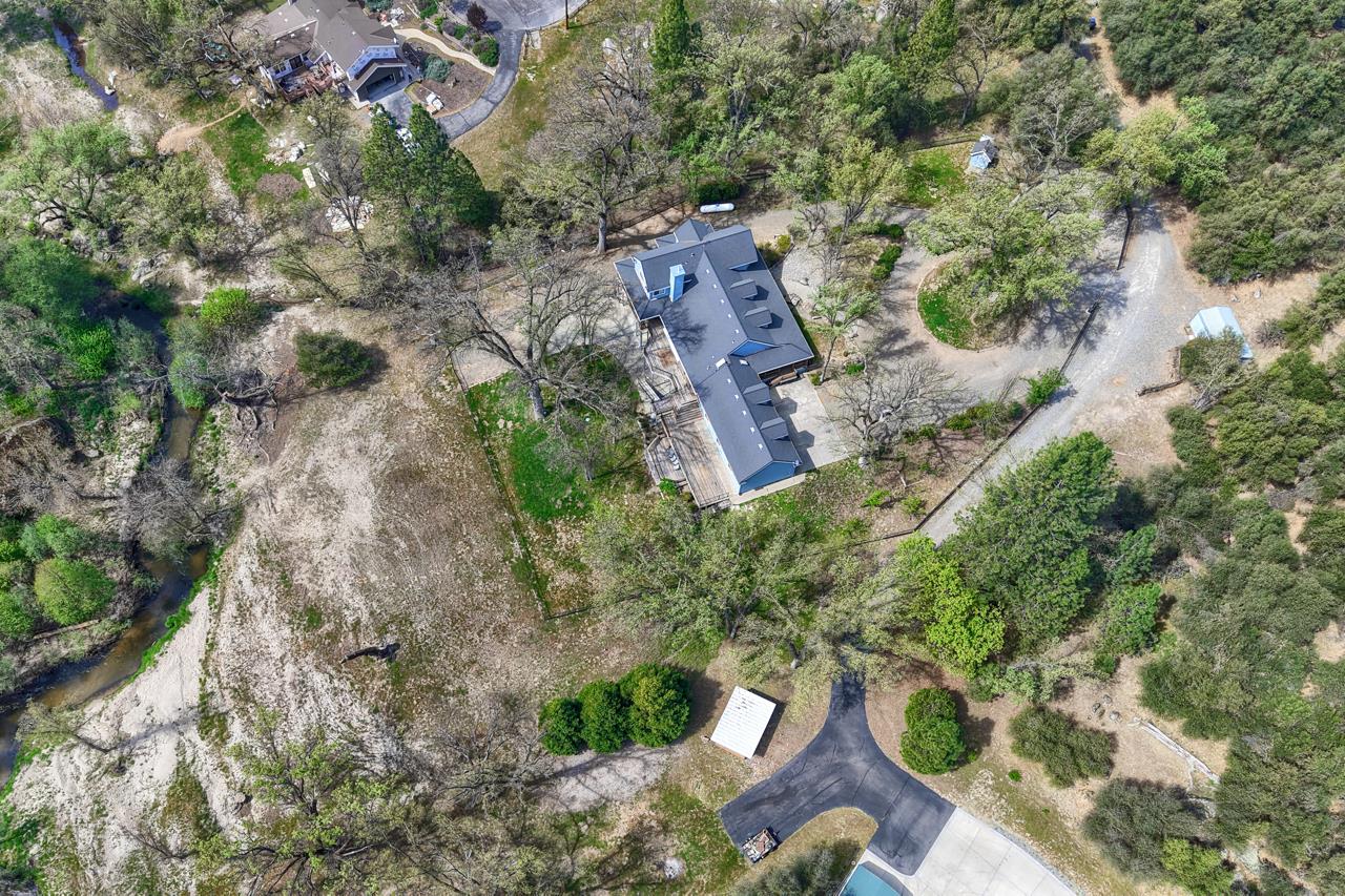 46580 Vista Del Rio Drive Oakhurst, CA 93644 - Photo 75 of 82 an aerial view of a house with a yard