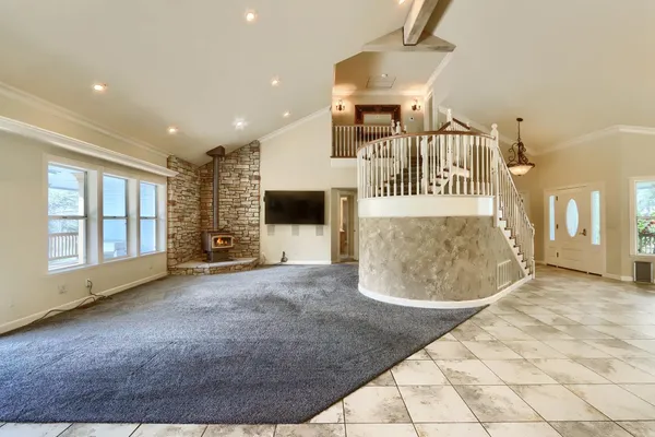a kitchen with granite countertop white cabinets stainless steel appliances and sink