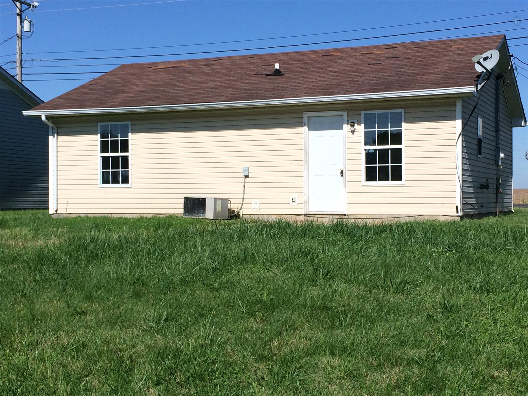 955 State Line Road Oak Grove, KY 42262 - Photo 3 of 14 a view of a house with a yard