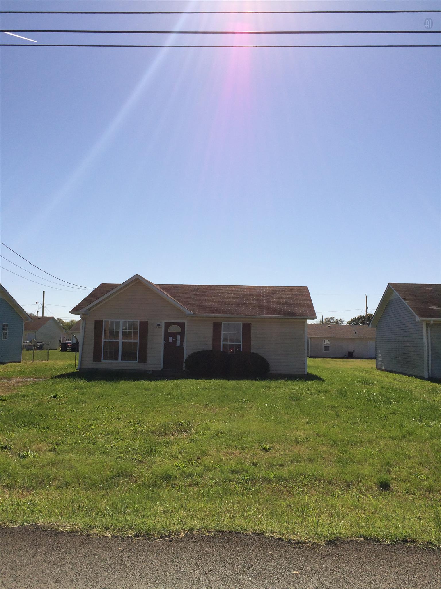 955 State Line Road Oak Grove, KY 42262 - Photo 4 of 14 a view of a city with tall buildings in a yard