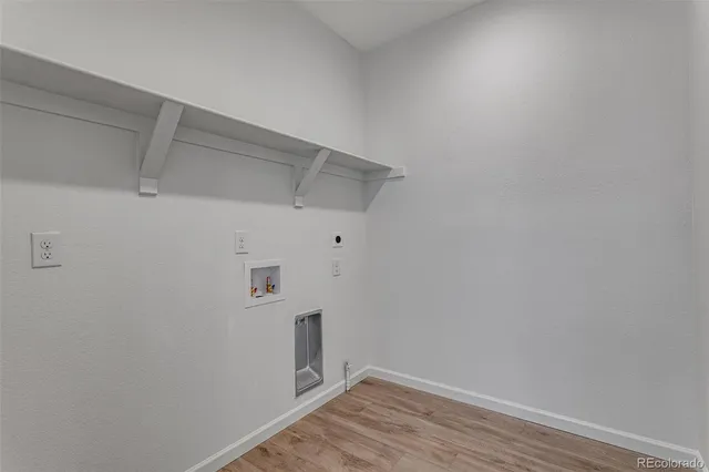 a view of a hallway with closet