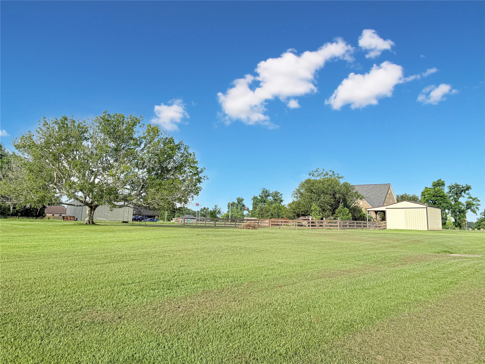 807 Mill Road Angleton, TX 77515 - Photo 43 of 46 Enjoy peaceful country living with a spacious backyard and scenic natural surroundings.