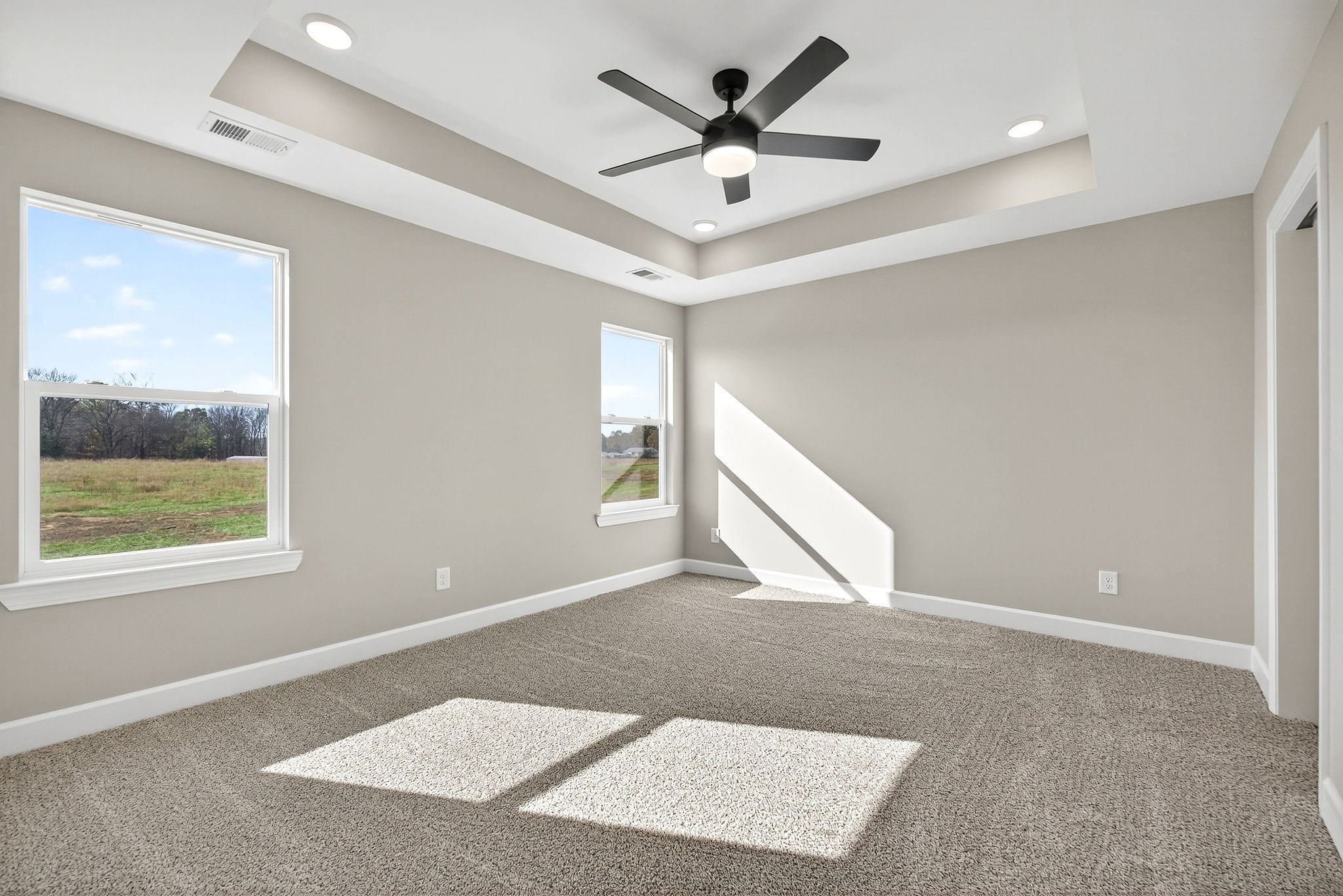 774 C Rody Road McMinnville, TN 37110 - Photo 16 of 40 a view of an empty room with a window and a ceiling fan
