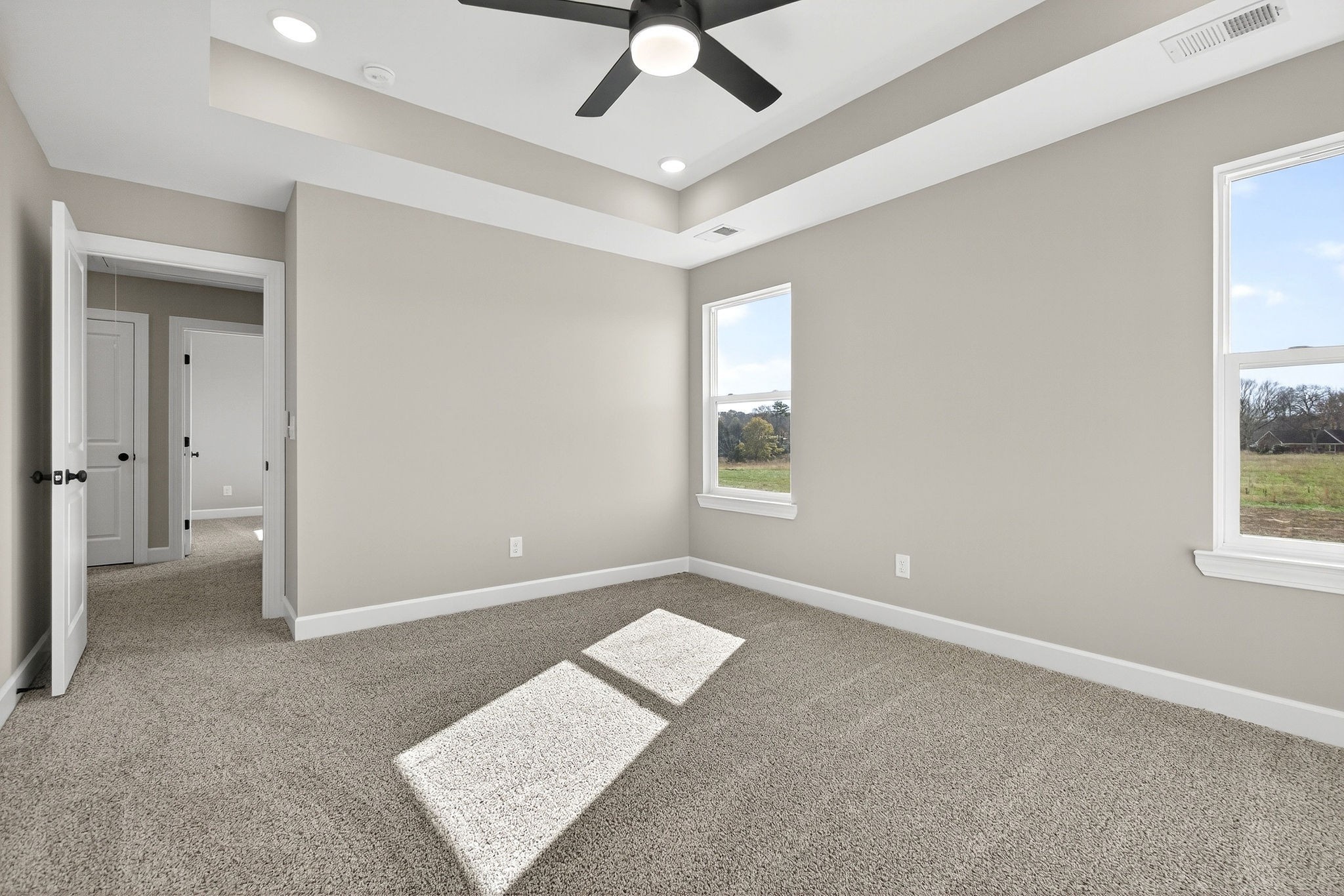 774 C Rody Road McMinnville, TN 37110 - Photo 18 of 40 an empty room with windows and fan