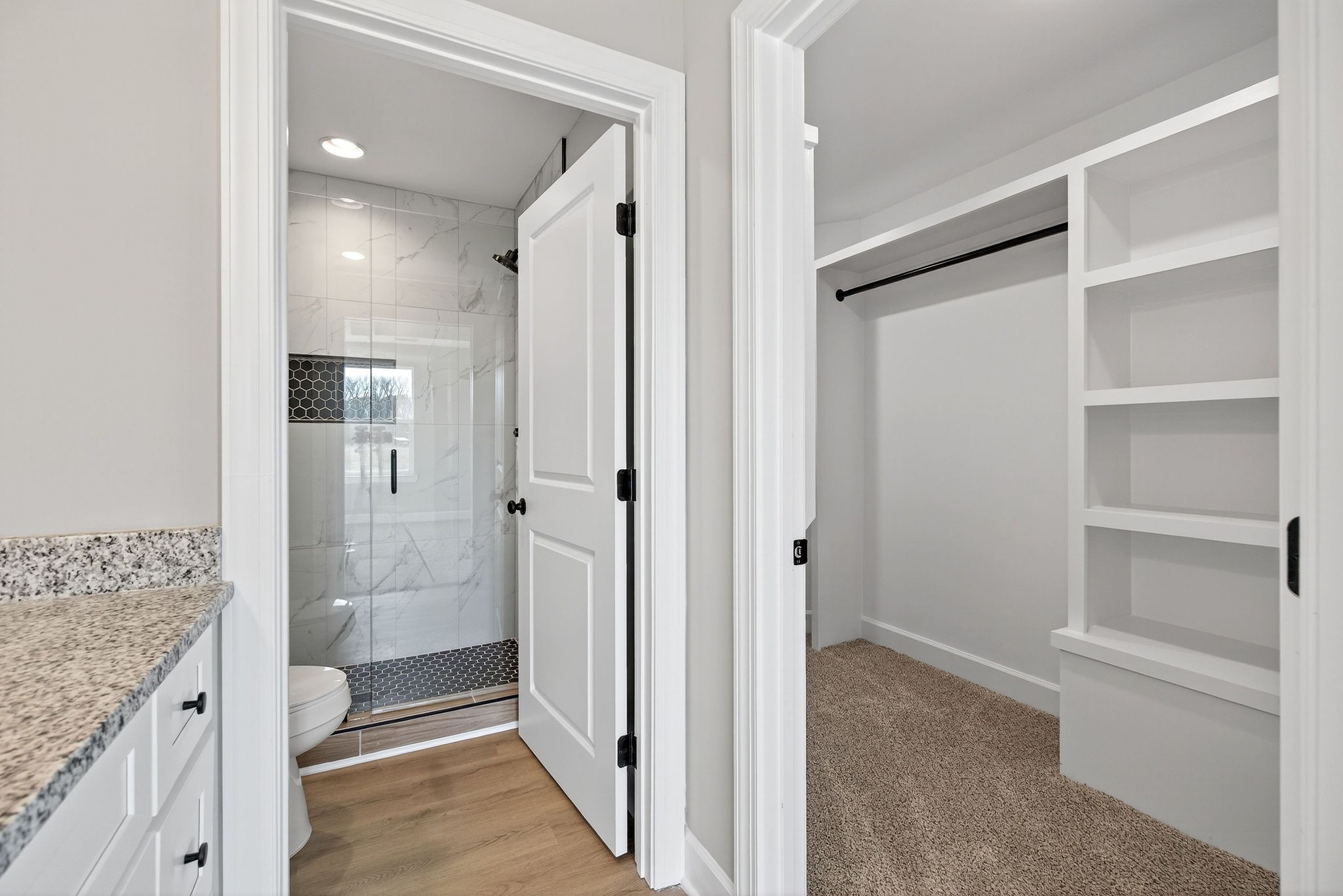774 C Rody Road McMinnville, TN 37110 - Photo 19 of 40 a bathroom with a granite countertop sink a toilet and shower
