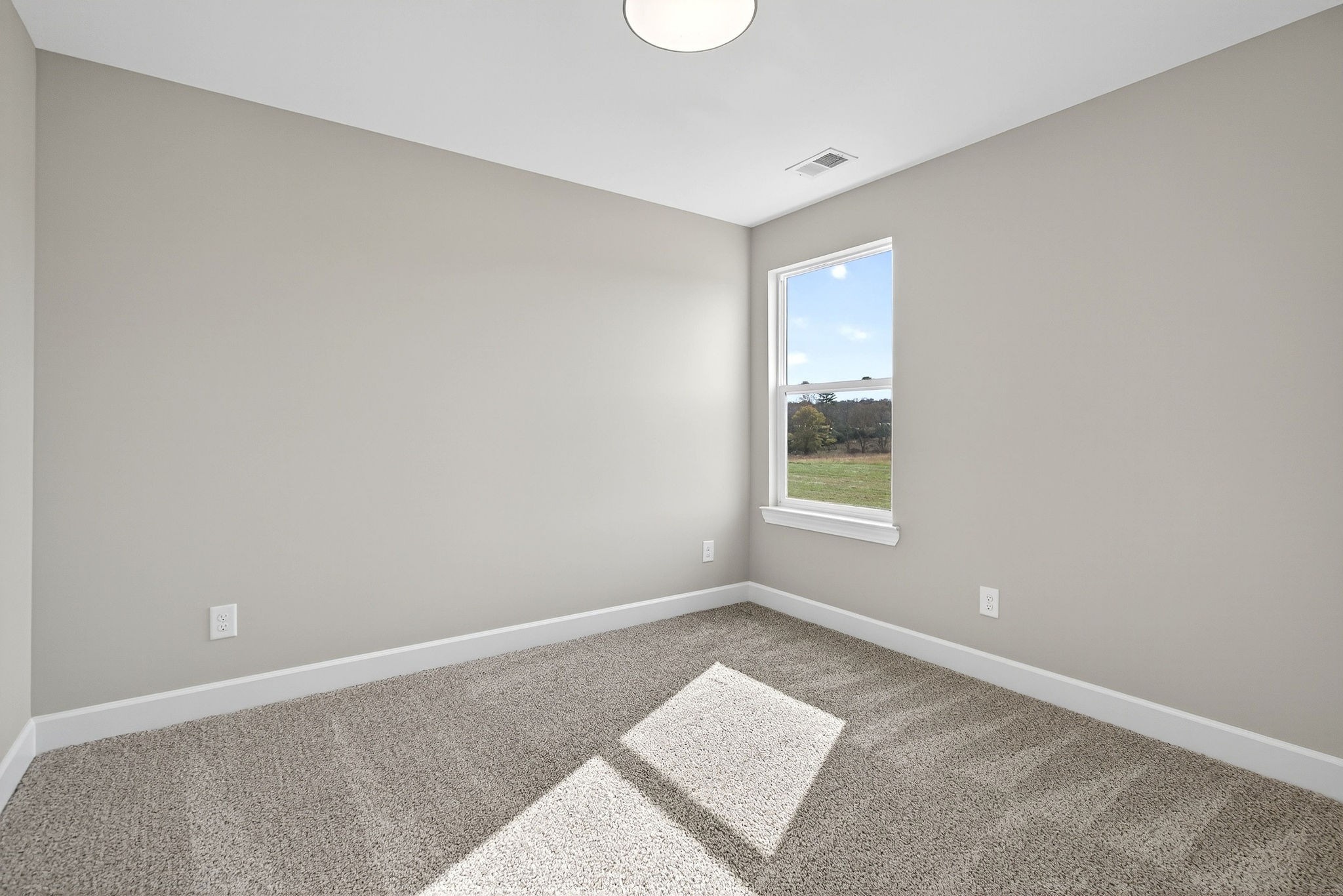 774 C Rody Road McMinnville, TN 37110 - Photo 22 of 40 a view of an empty room with a window