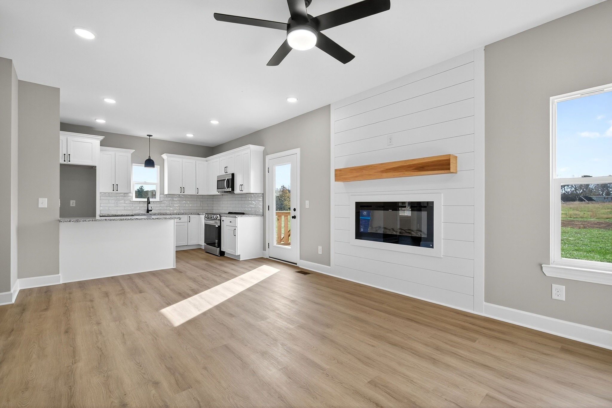 774 C Rody Road McMinnville, TN 37110 - Photo 6 of 40 a view of kitchen with kitchen island wooden floor and stainless steel appliances