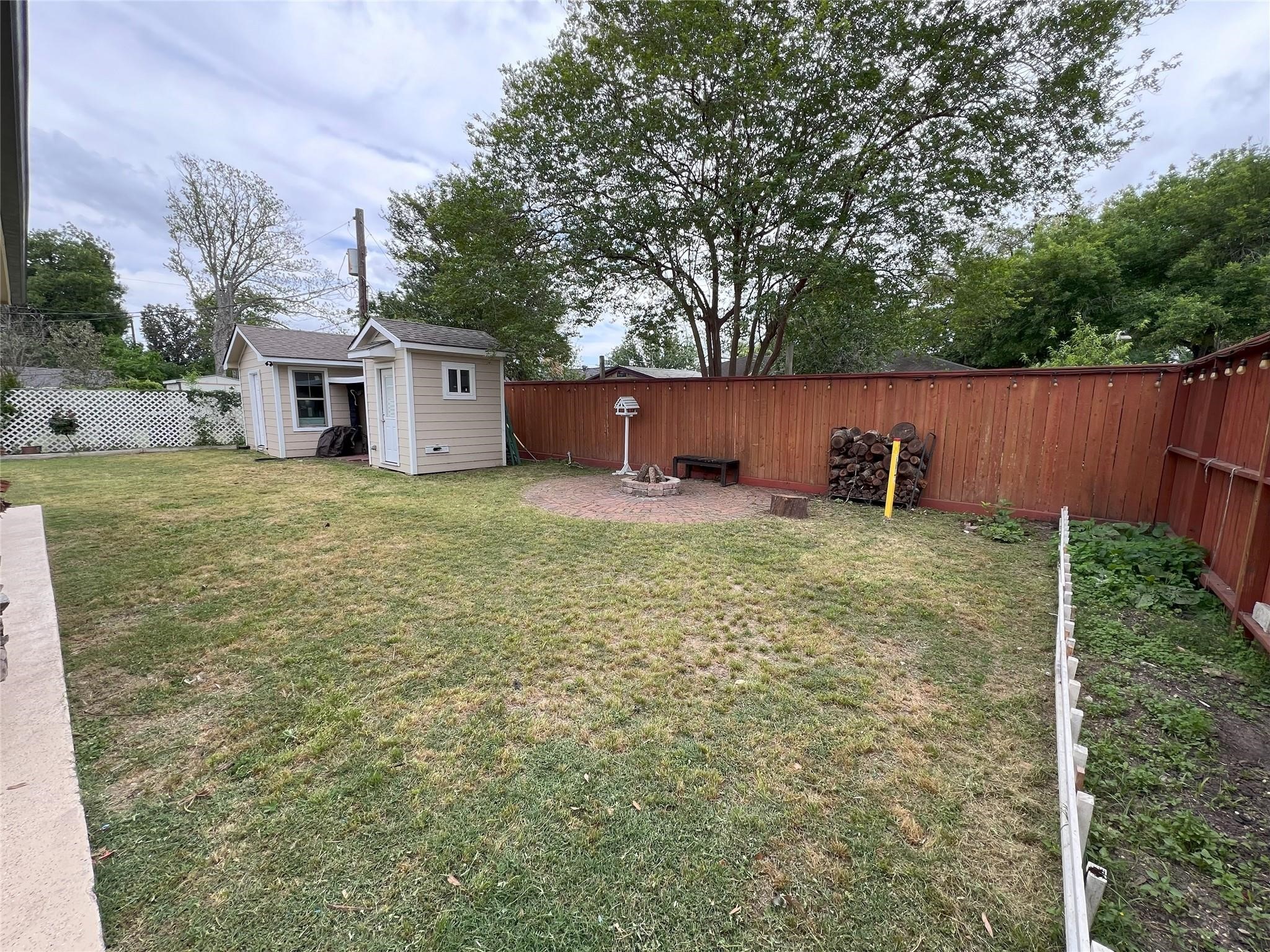 4731 High Point Lane Houston, TX 77053 - Photo 16 of 16 a backyard of a house with table and chairs
