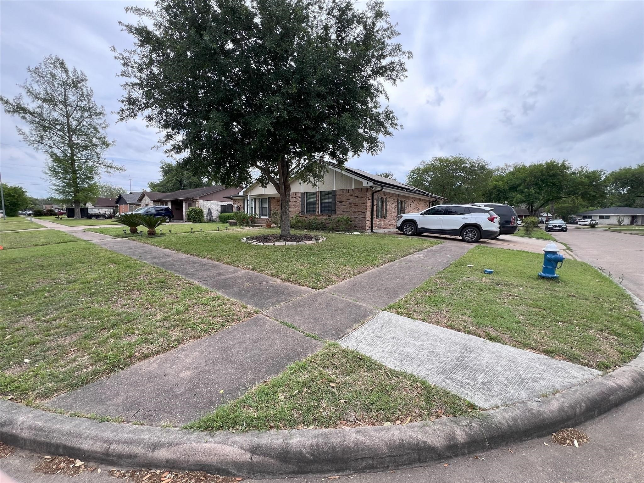 4731 High Point Lane Houston, TX 77053 - Photo 2 of 16 a view of a house with a yard porch and sitting area