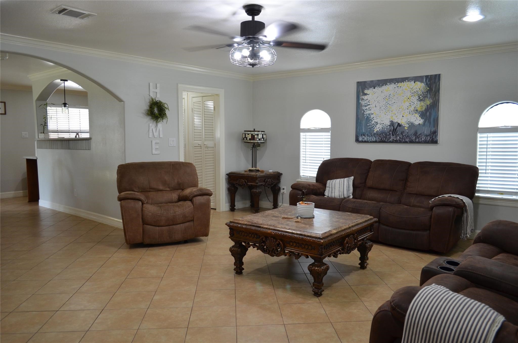 4731 High Point Lane Houston, TX 77053 - Photo 3 of 16 a living room with furniture a rug and a window