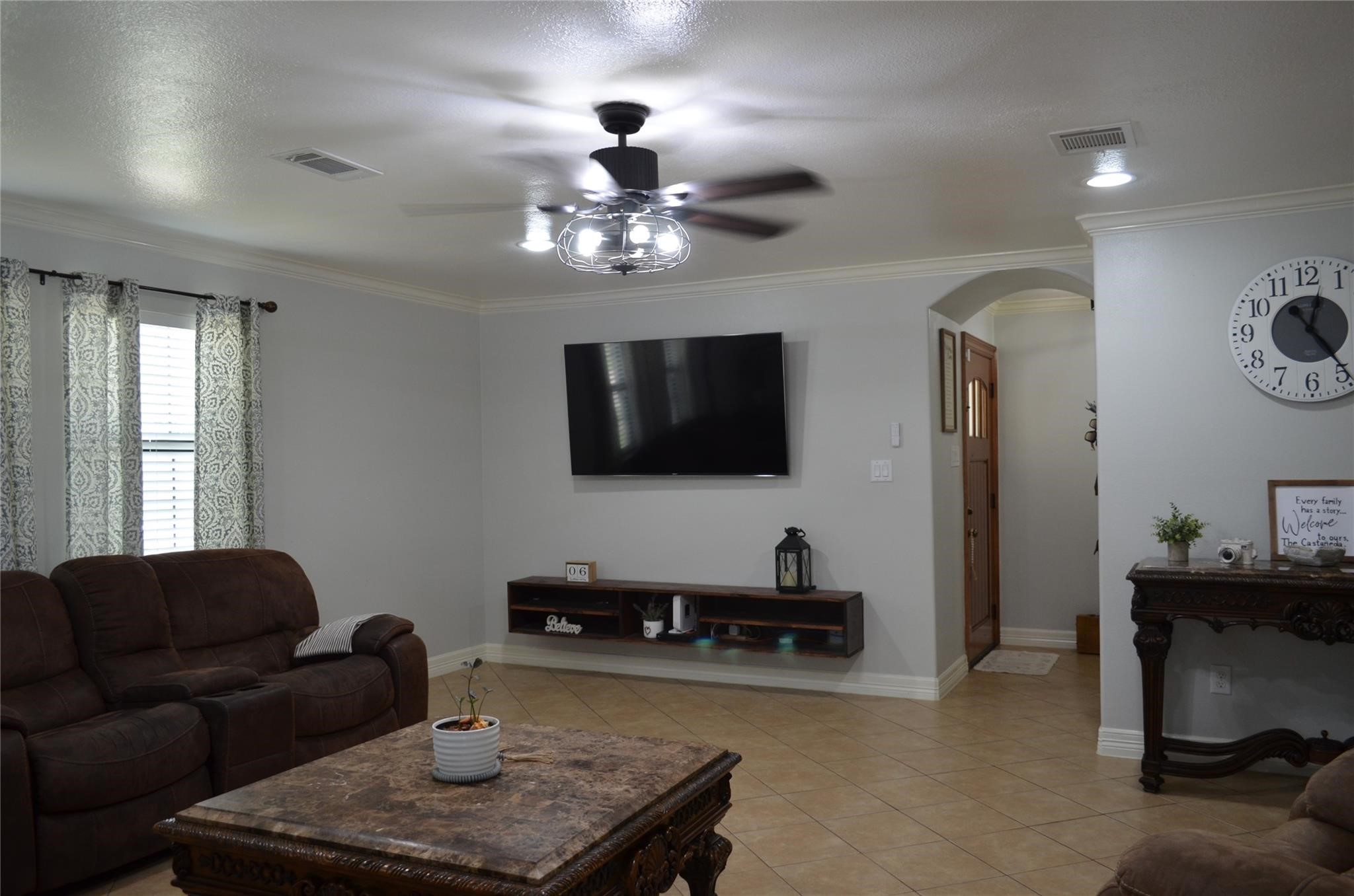 4731 High Point Lane Houston, TX 77053 - Photo 4 of 16 a living room with furniture and a flat screen tv