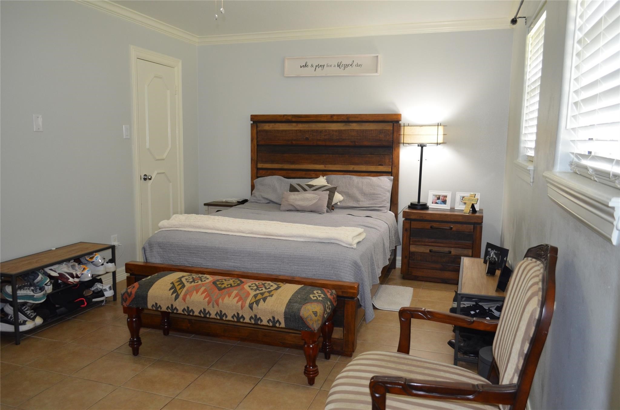 4731 High Point Lane Houston, TX 77053 - Photo 7 of 16 a bedroom with a bed and a tv