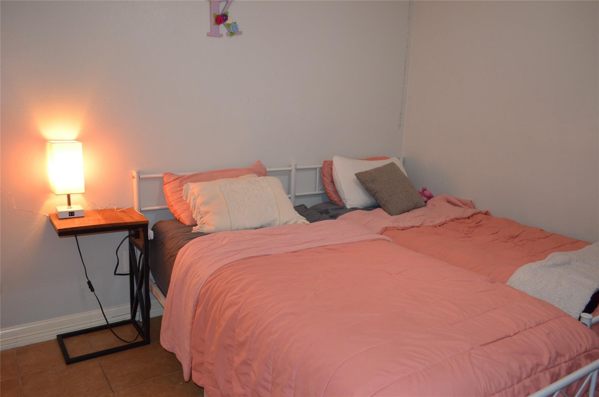 4731 High Point Lane Houston, TX 77053 - Photo 10 of 16 a bedroom with a bed and chair