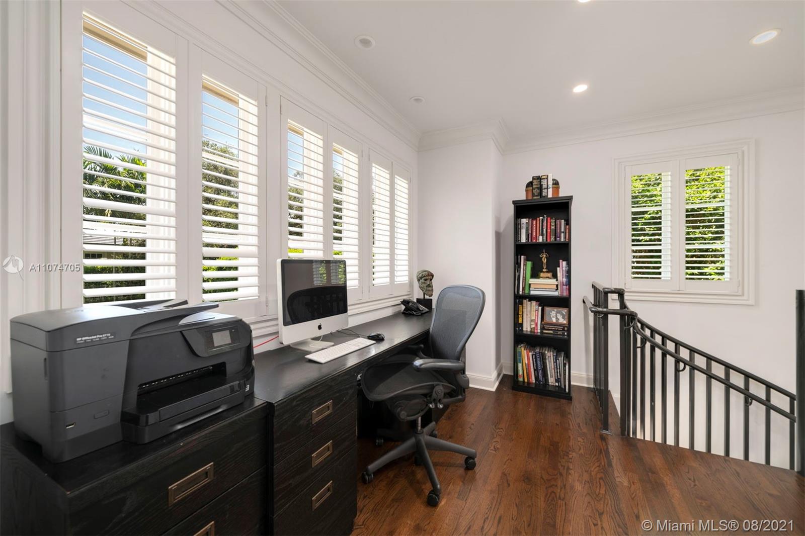 1000 Hardee Road Coral Gables, FL 33146 - Photo 11 of 26 a view of a workspace with furniture and a window