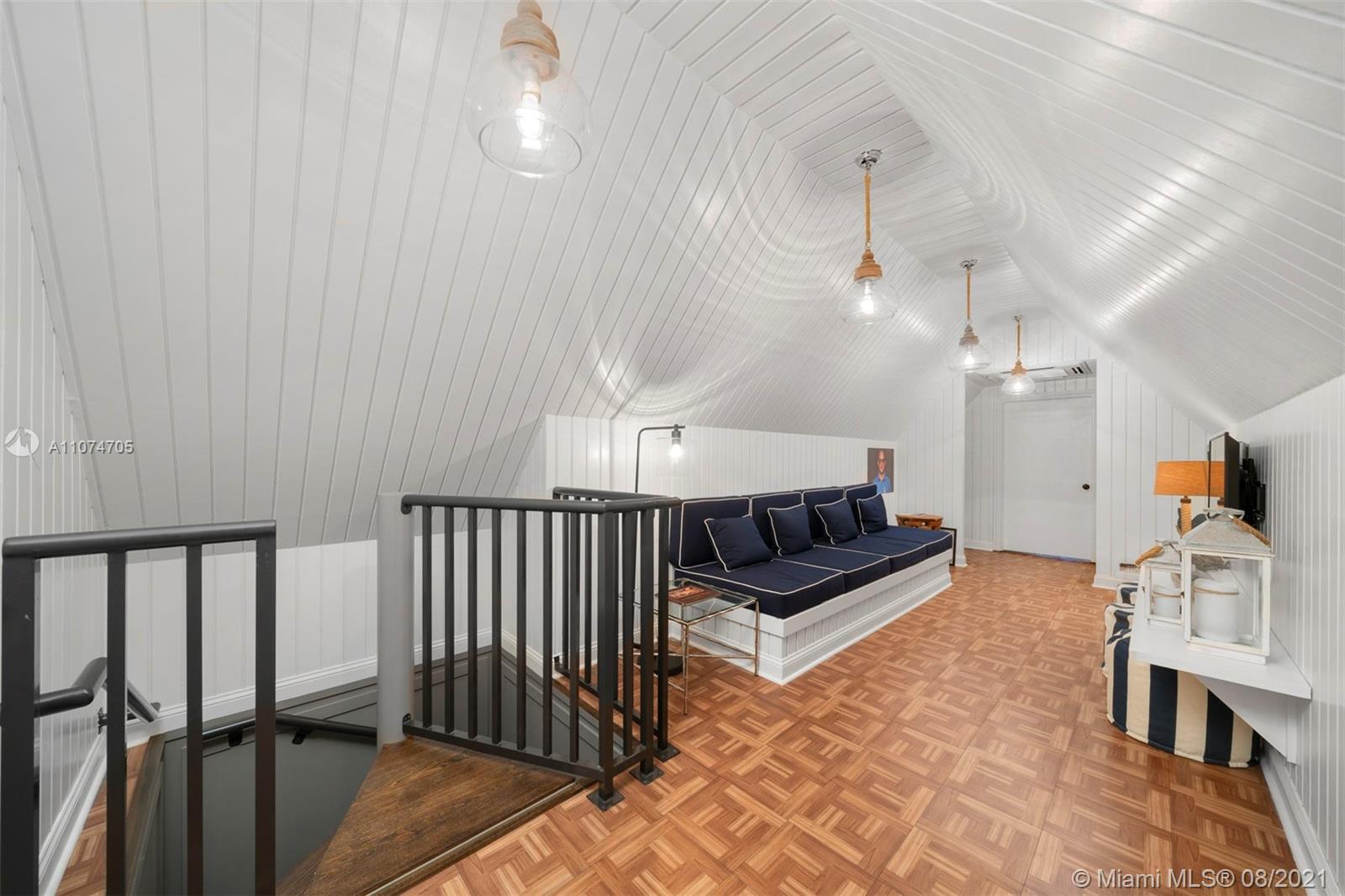 1000 Hardee Road Coral Gables, FL 33146 - Photo 13 of 26 a view of a livingroom with furniture and a ceiling fan