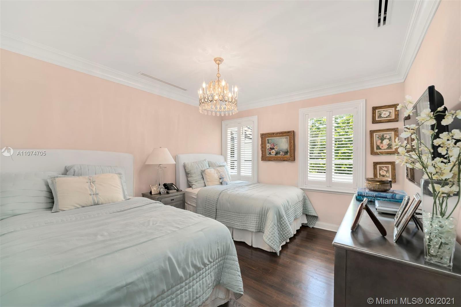 1000 Hardee Road Coral Gables, FL 33146 - Photo 17 of 26 a bedroom with two beds and a large window