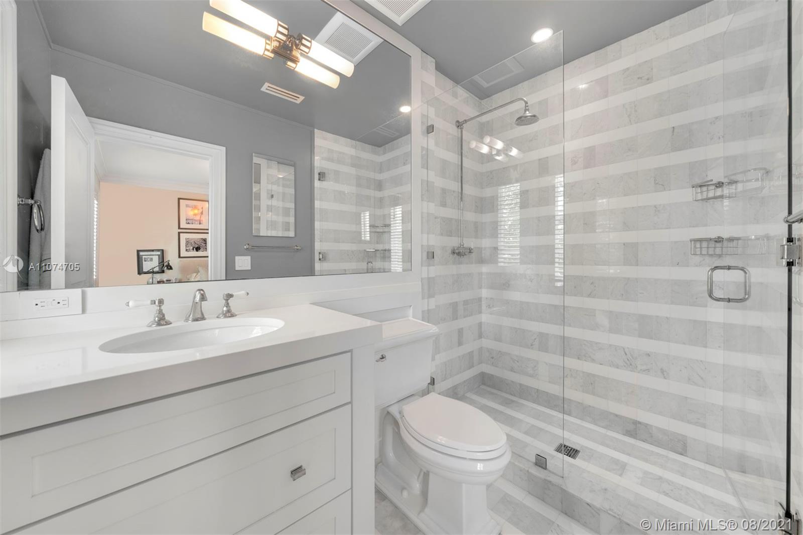 1000 Hardee Road Coral Gables, FL 33146 - Photo 18 of 26 a bathroom with a sink a toilet and shower