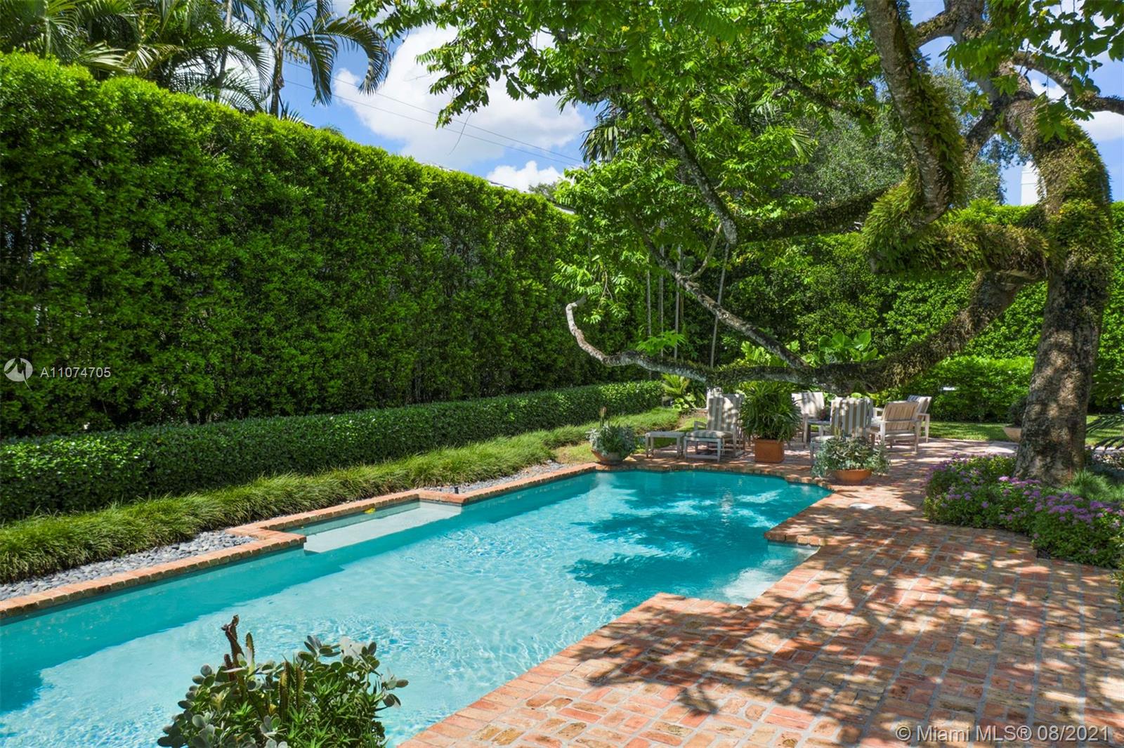 1000 Hardee Road Coral Gables, FL 33146 - Photo 22 of 26 a view of a garden with a lake