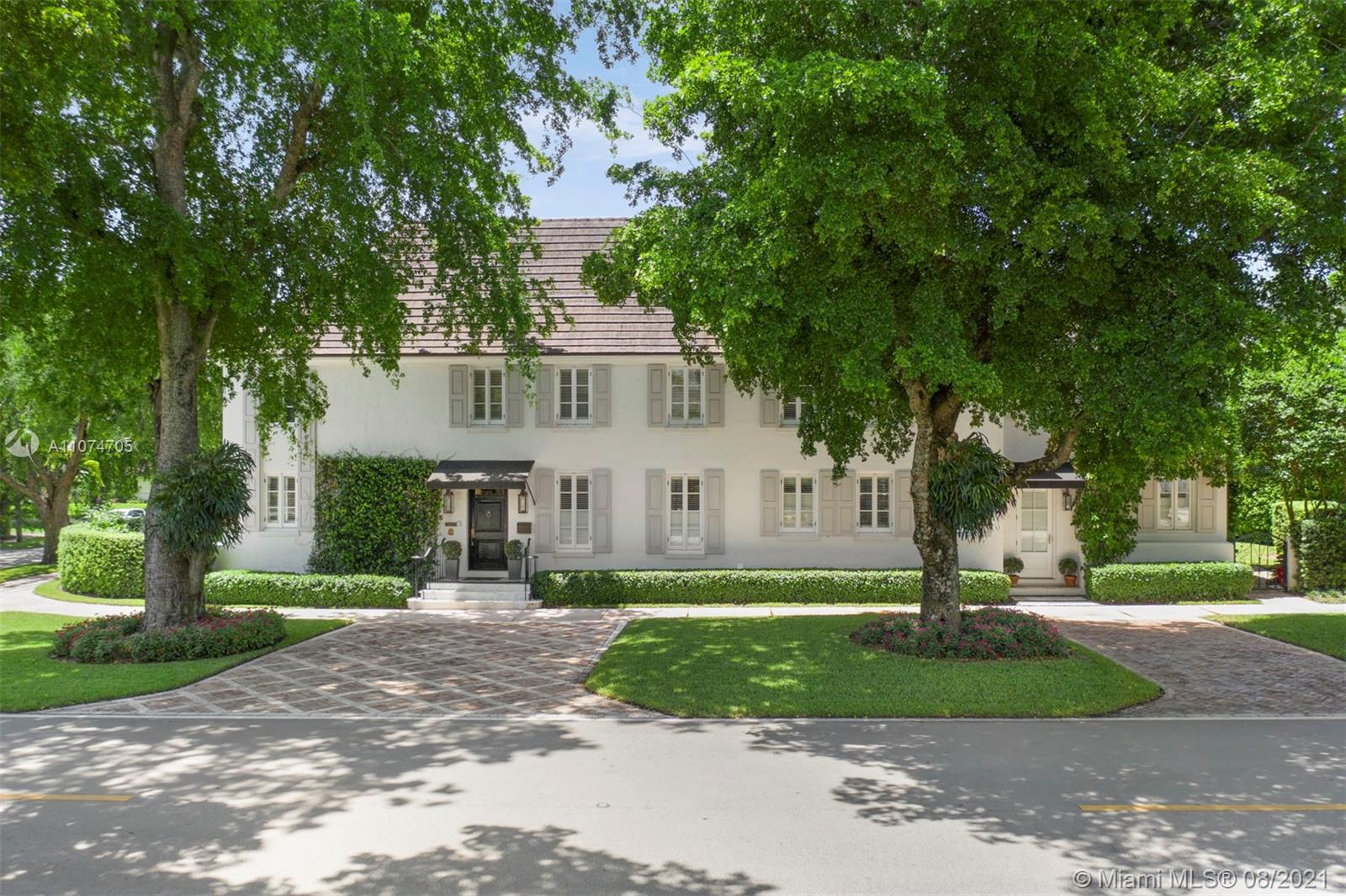 1000 Hardee Road Coral Gables, FL 33146 - Photo 25 of 26 a front view of a house with a yard