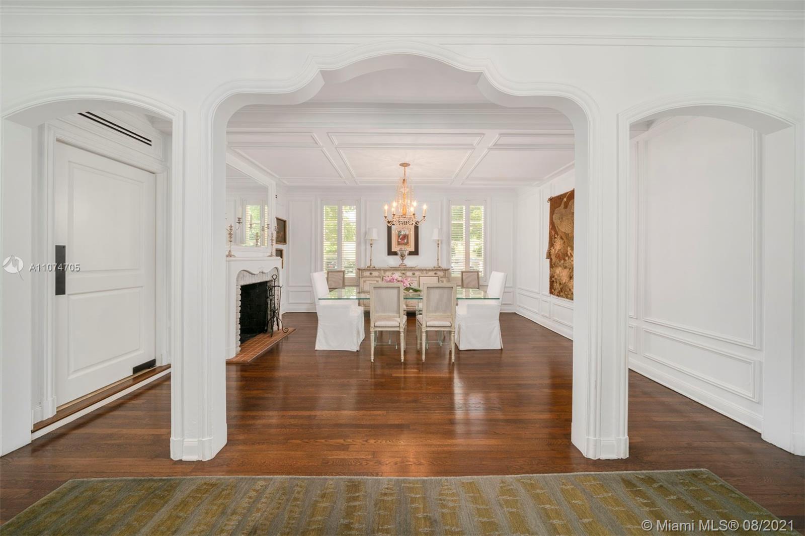 1000 Hardee Road Coral Gables, FL 33146 - Photo 4 of 26 a view of a dining room with furniture and wooden floor