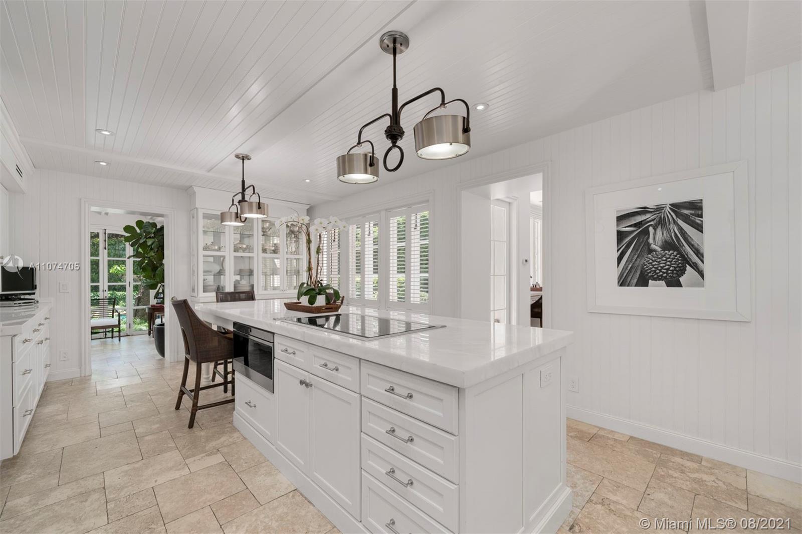 1000 Hardee Road Coral Gables, FL 33146 - Photo 5 of 26 a kitchen with a counter space cabinets and appliances