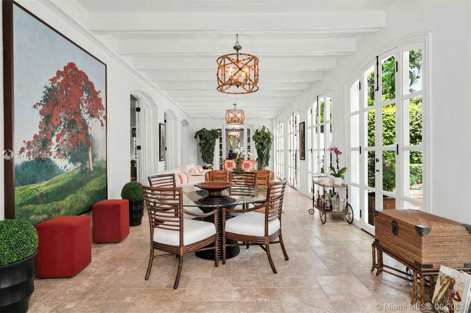 1000 Hardee Road Coral Gables, FL 33146 - Photo 7 of 26 a dining room with furniture and a floor to ceiling window
