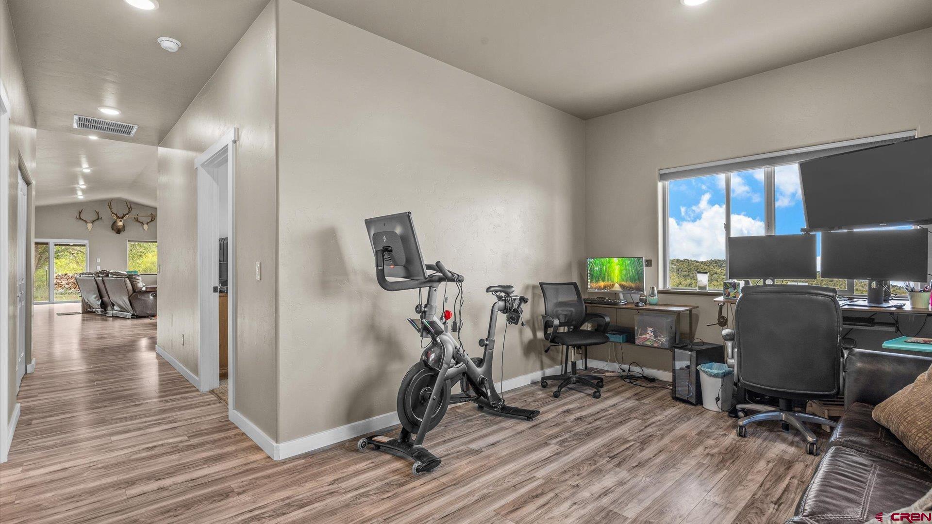 25571 Vail Road Cedaredge, CO 81413 - Photo 24 of 35 a view of a room with gym equipment