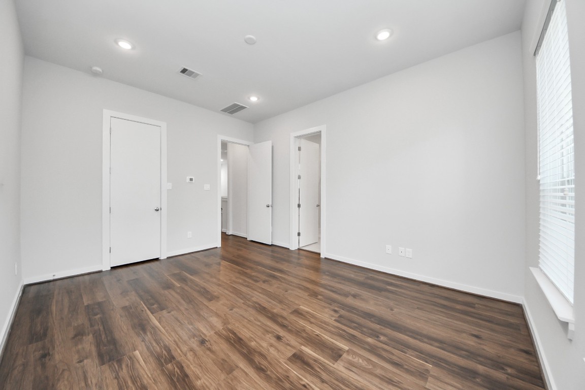 608 Thornton Road, Unit A Houston, TX 77018 - Photo 35 of 44 a view of an empty room with wooden floor