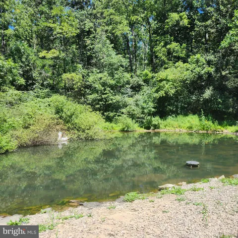 a view of a room with a large window