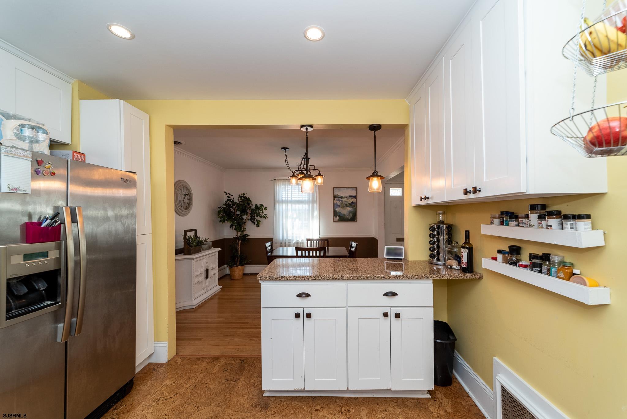 601 Amherst Road Audubon, NJ 08106 - Photo 13 of 30 a kitchen with granite countertop a sink cabinets and stainless steel appliances