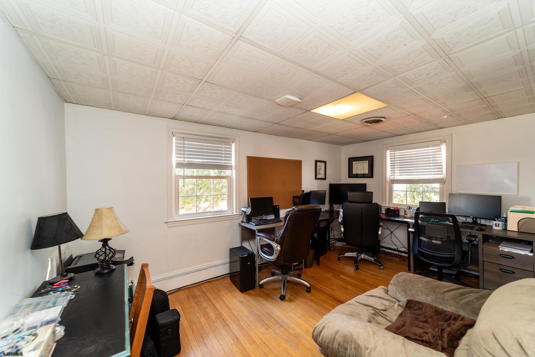601 Amherst Road Audubon, NJ 08106 - Photo 20 of 30 a view of a livingroom with workspace and a window