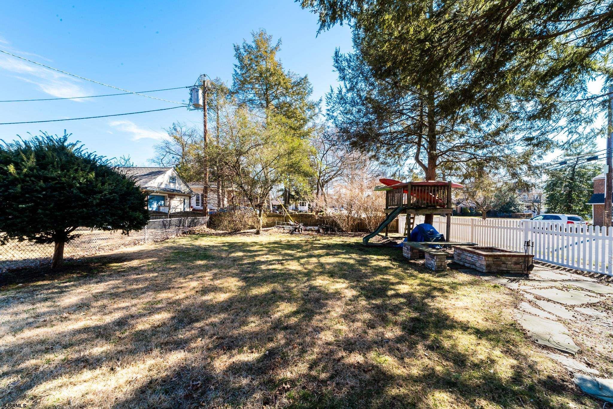 601 Amherst Road Audubon, NJ 08106 - Photo 25 of 30 a view of a backyard with a tree