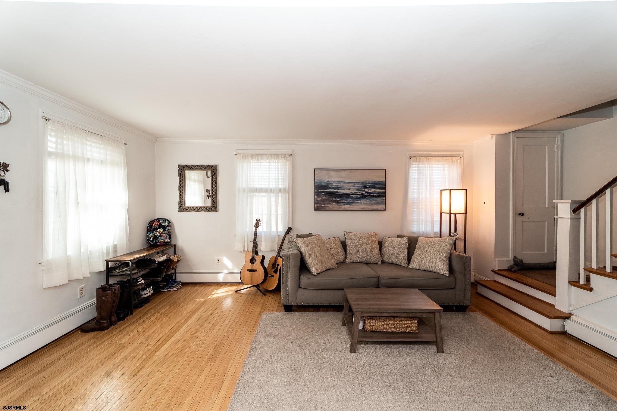 601 Amherst Road Audubon, NJ 08106 - Photo 10 of 30 a living room with furniture and a flat screen tv