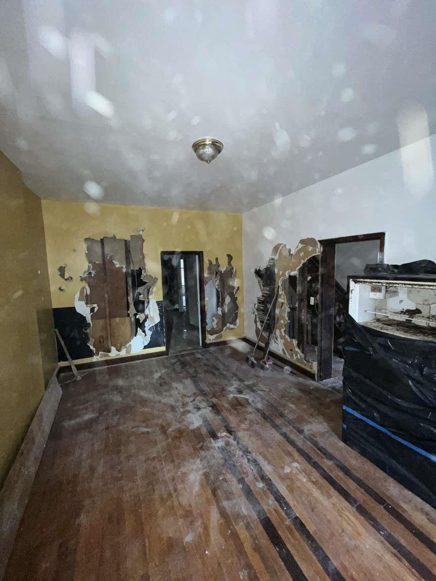 1430 Pacific Street Brooklyn, NY 11216 - Photo 11 of 24 Misc room featuring dark wood-type flooring