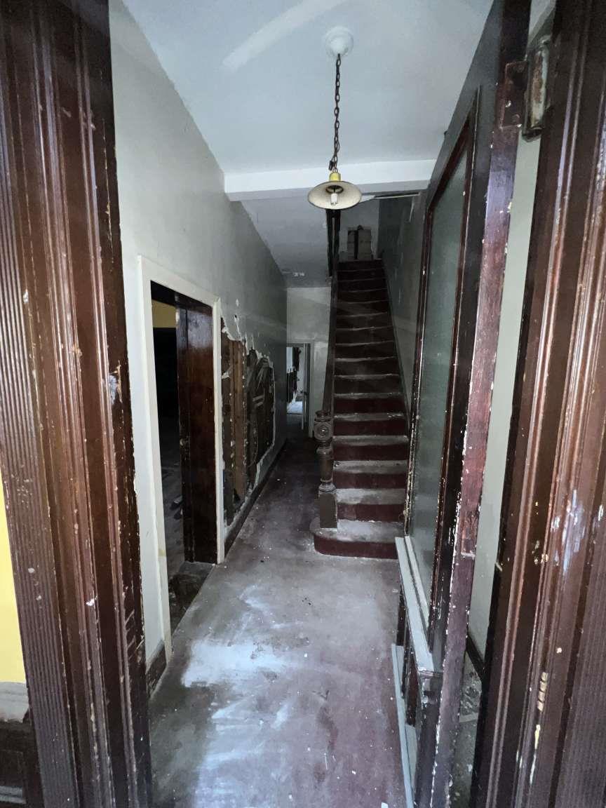 1430 Pacific Street Brooklyn, NY 11216 - Photo 16 of 24 Stairway with concrete floors