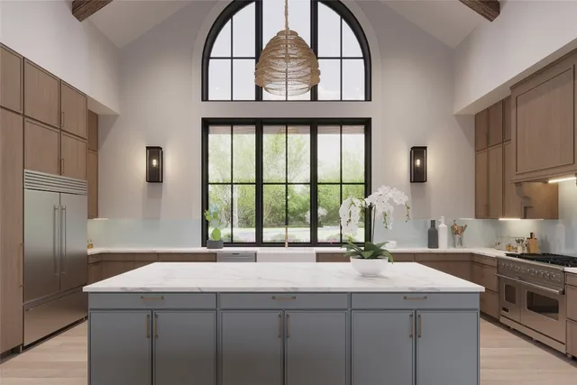 a bedroom with a large bed couch and a large window