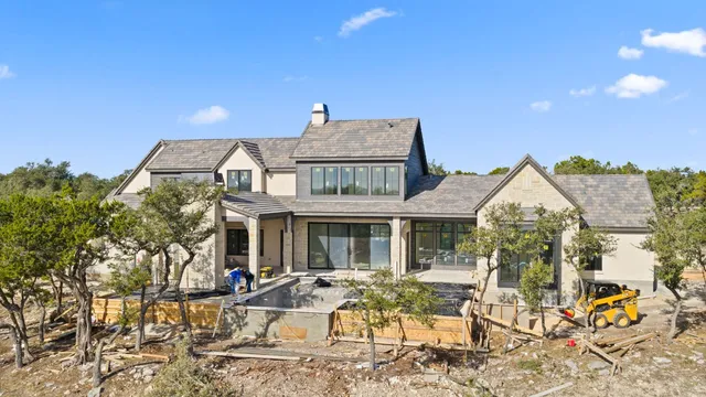 a view of a building with outdoor seating space