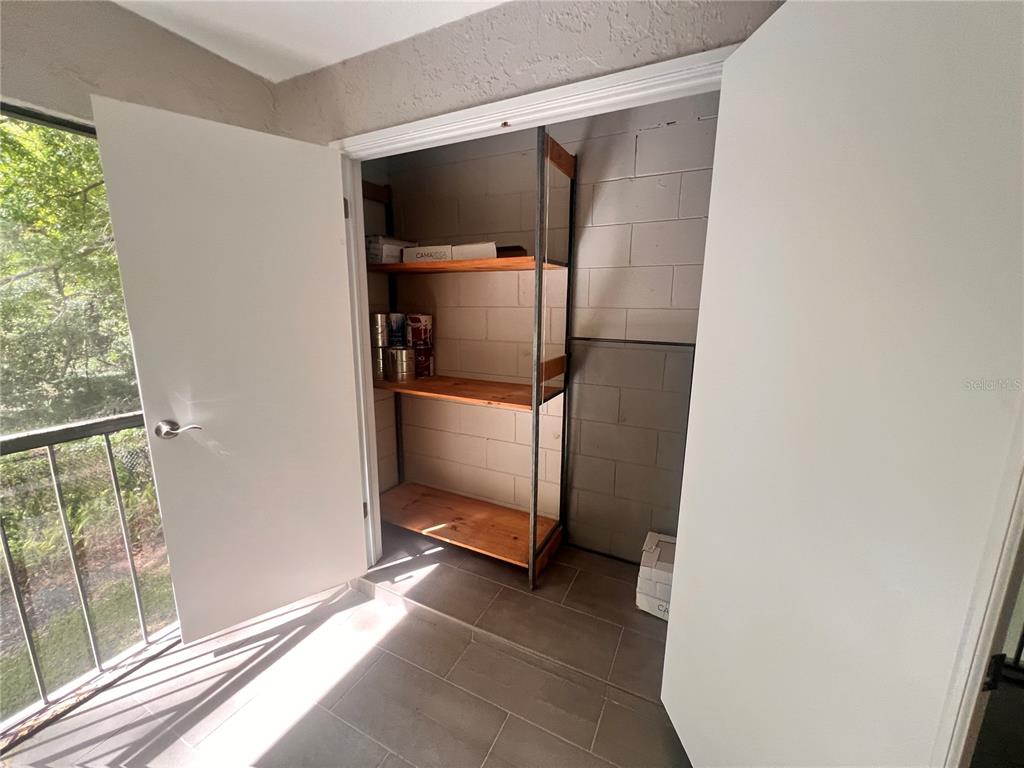 17 Escondido Circle, Unit 239 Altamonte Springs, FL 32701 - Photo 12 of 30 a view of a walk in closet